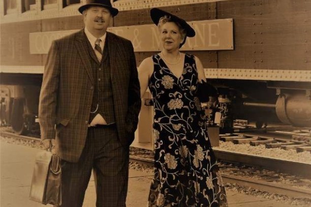 a group of people standing in front of a building