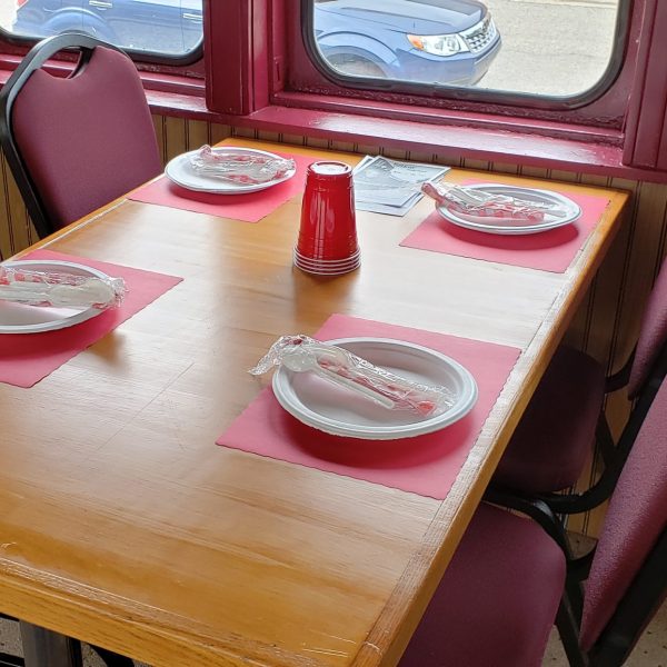 a cake sitting on top of a wooden chair