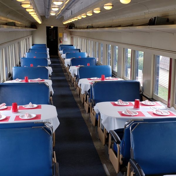 a room filled with furniture and a large window