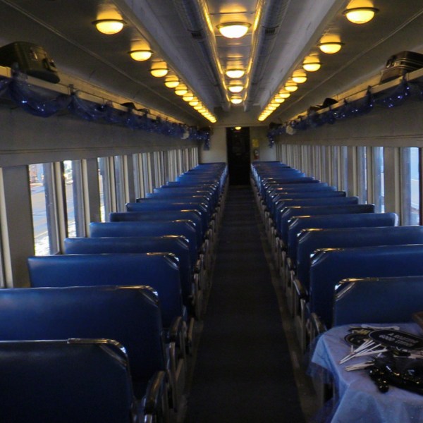 a room filled with furniture and a large window