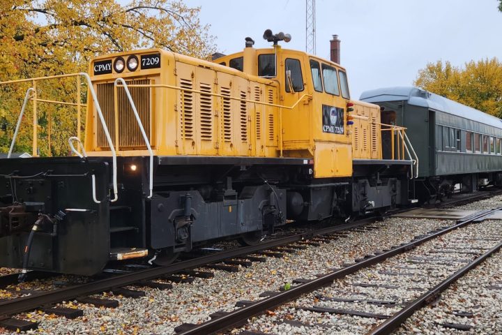 a train that is sitting on a railroad track