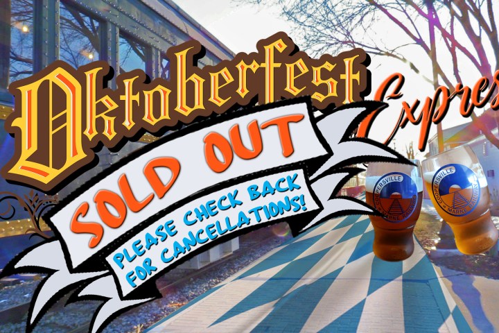 Oktoberfest Express sign with 'Sold Out' notice in a festive setting.
