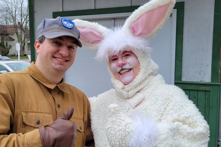 a person holding a stuffed animal
