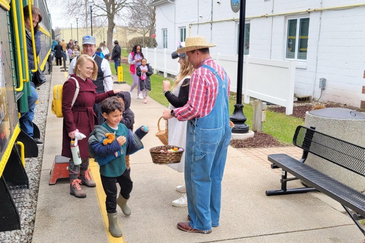 a group of people standing outside of a building
