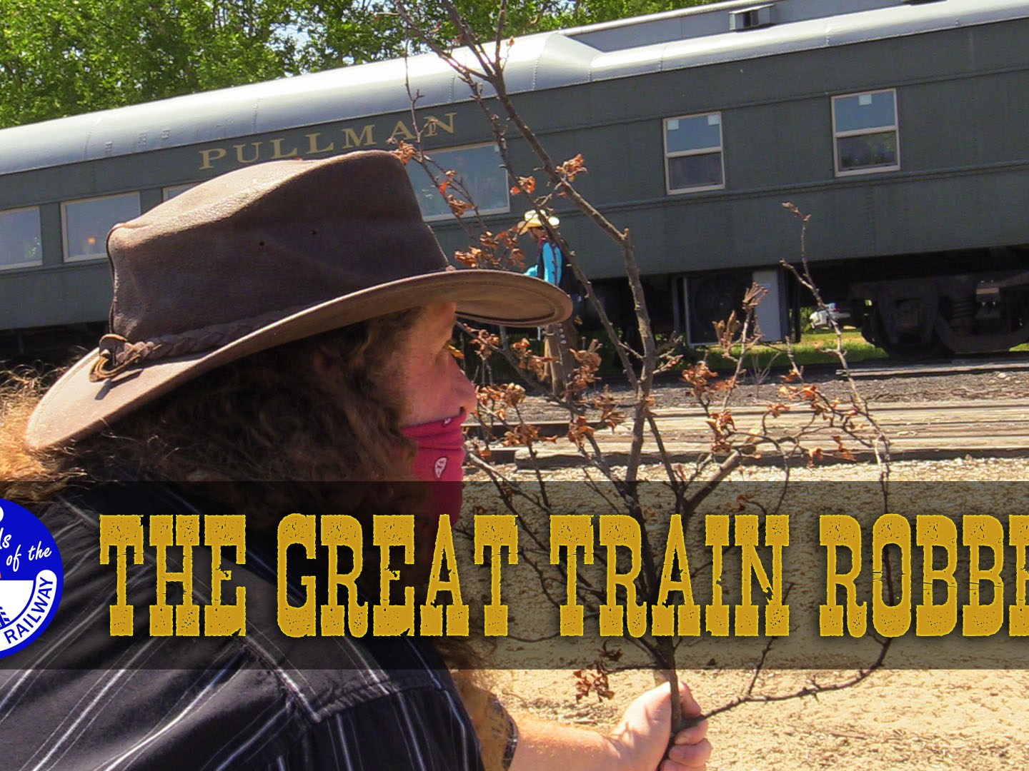 a person sitting on a train track